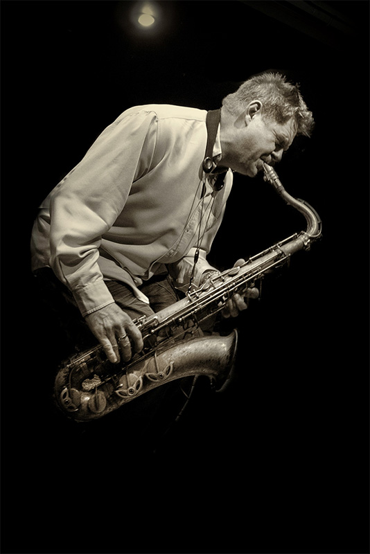 Derek Nash on saxophone